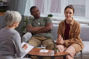 Couple discussing relationship concerns during a professional counseling session